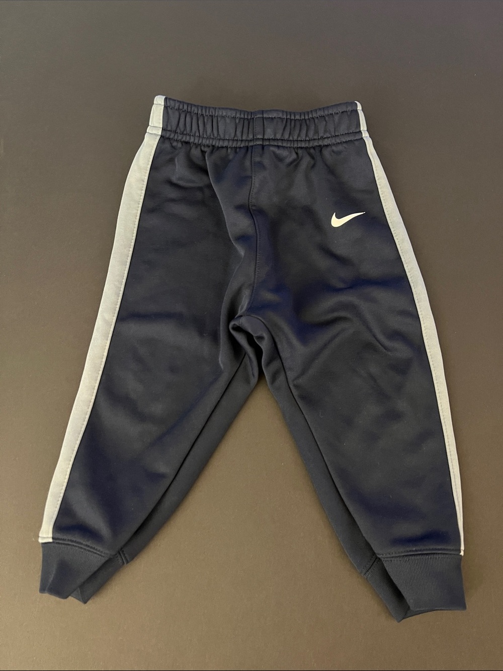 Nike Kids Navy Joggers with Light Gray Side Stripes
